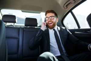 A man makes a call on his cell phone