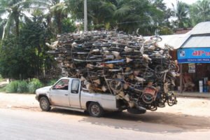 A logging truck on a dirt road