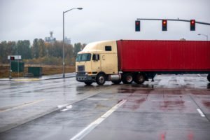 A big rig crossing an intersection.