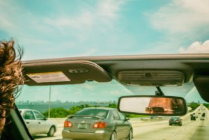 A man driving on a Florida highway.