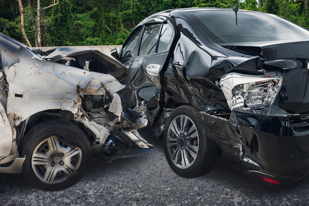 aftermath showing heavy damages from vehicle collision