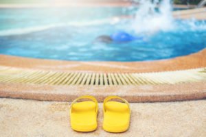flip-flops at a pool