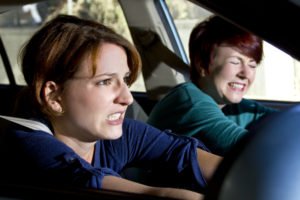 two women bracing for car crash