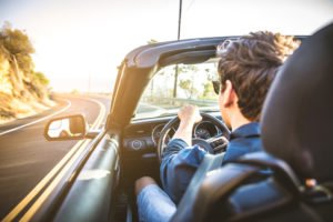 young guy driving