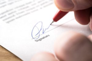 person signing settlement documents