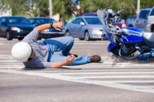 motorcycle rider thrown off his bike after an accident