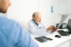 patient consults with doctor