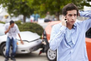 young driver calls his parents after a crash