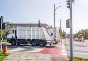garbage-truck-passing-through-an-intersection